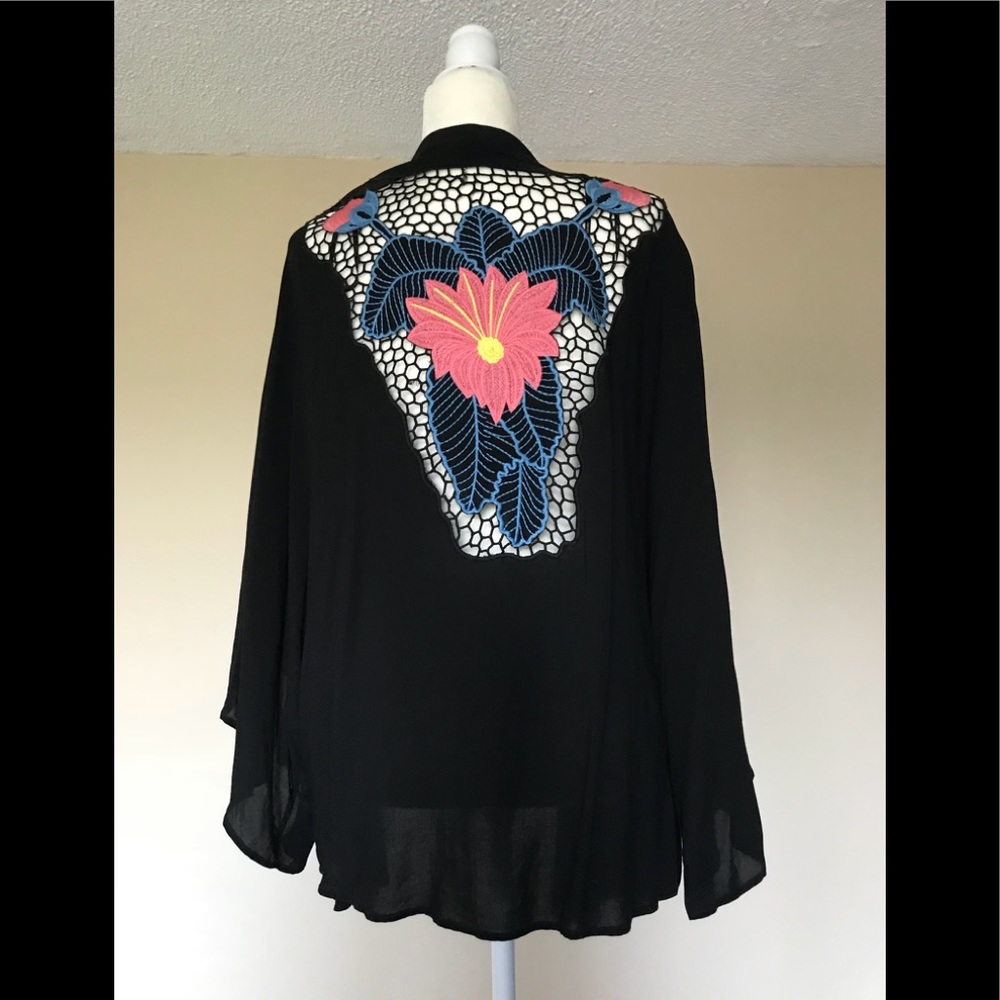 Cape/jacket with Dolman sleeves